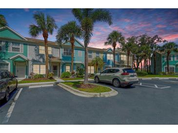 Charming townhomes with vibrant exteriors, lush landscaping, and convenient parking at 4727 Sabal Key Dr # 4727, Bradenton, FL 34203