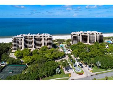 Luxury beachfront condominiums featuring stunning ocean views, lush landscaping, and resort-style amenities at 435 L Ambiance Dr # Ph-J, Longboat Key, FL 34228