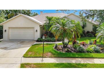 Well maintained home with mature landscaping at 8047 Desoto Woods Dr, Sarasota, FL 34243