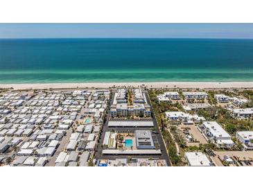 Beautiful beachfront condo complex, offering stunning ocean views and community amenities at 3806 Gulf Of Mexico Dr # C204, Longboat Key, FL 34228