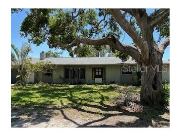 Charming single story home with mature tree in the front yard at 4959 Habana Dr, Sarasota, FL 34235