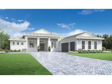 Stunning single-story home features a paver driveway, lush landscaping and a welcoming front porch at 8045 Nevis Run, Bradenton, FL 34202
