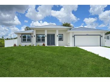 Charming single-Gathering home featuring manicured lawn and a contemporary design at 2794 Escambia Cir, North Port, FL 34288