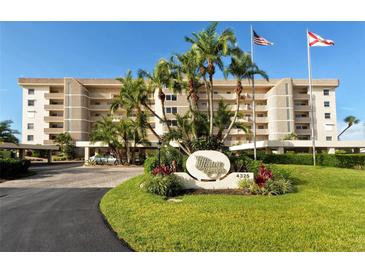 Beautiful Tiffany Plaza Condo with well-maintained grounds and landscaping at 4325 Gulf Of Mexico Dr # 204, Longboat Key, FL 34228