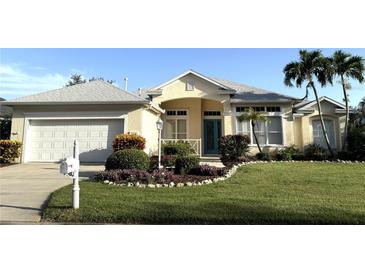 Charming single Gathering home featuring well-manicured lawn and two-car garage at 8616 15Th Nw Ave, Bradenton, FL 34209
