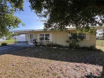 Well-maintained home featuring a covered carport, offering a blend of comfort and convenience at 1224 38Th W St, Bradenton, FL 34205