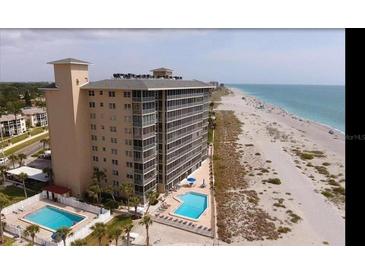 Expansive coastal condominium with multiple pools and beach access, offering luxurious waterfront living at 555 The Esplanade N # 202, Venice, FL 34285