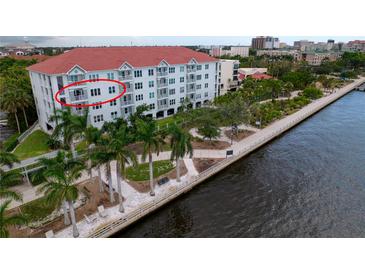 Beautiful condo building with waterfront views and lush tropical landscaping at 210 3Rd W St # 8308, Bradenton, FL 34205
