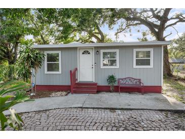Charming single-story home with a well-maintained exterior and landscaped yard at 2005 Gillespie Ave, Sarasota, FL 34234
