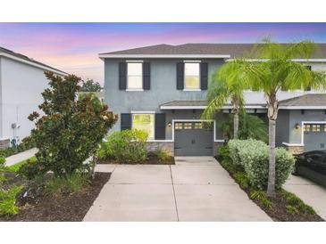 Charming two-story home with well-manicured landscaping and inviting curb appeal at 6454 Baytown Dr, Sarasota, FL 34240