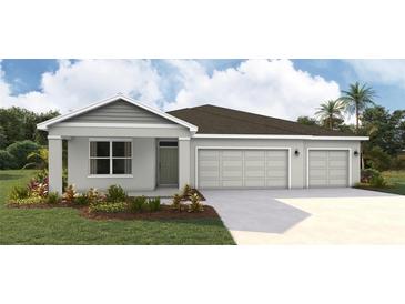 Charming single-story home featuring a two-car garage and a well-maintained lawn and landscape at 17460 Whiskey Creek Trl, Parrish, FL 34219