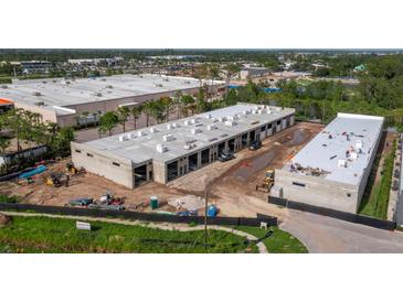 Commercial property featuring a newly constructed storage condominium with an in-progress exterior and modern design at 829 57Th E St # A113, Bradenton, FL 34208