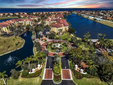 Aerial view of luxury waterfront community with resort-style amenities at 99 Vivante Blvd # 412, Punta Gorda, FL 33950