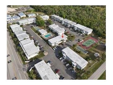 Bird's-eye view of the apartment complex and amenities at 22375 Edgewater Dr # 224, Port Charlotte, FL 33980