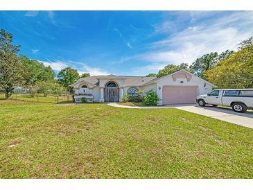 Photo one of 16626 Oxenham Ave Spring Hill FL 34610 | MLS C7491022