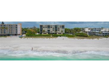 Aerial view of beachfront condo building and beach at 2675 Gulf Of Mexico Dr # 204, Longboat Key, FL 34228