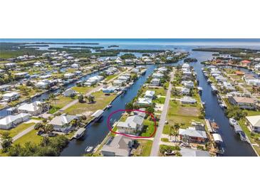 Waterfront home with boat dock and stunning canal access to Gulf of Mexico at 24313 Pirate Harbor Blvd, Punta Gorda, FL 33955