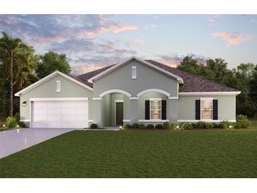 One-story home with a two-car garage and attractive curb appeal at 13436 High Springs Ave, Port Charlotte, FL 33981