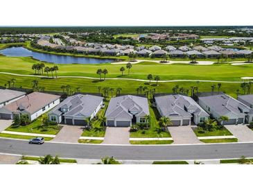 Luxury homes community with golf course and lake views at 25133 Longmeadow Dr, Punta Gorda, FL 33955