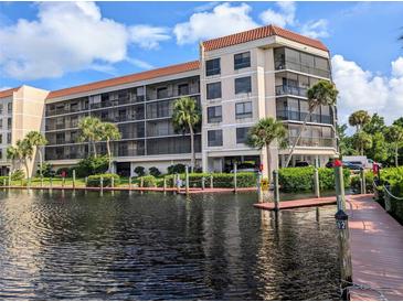 Canal front building with boat docks at 25188 Marion Ave # D101, Punta Gorda, FL 33950