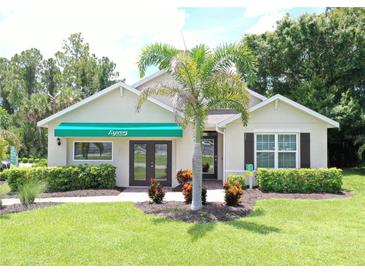 Attractive single-story home with landscaping and palm trees at 1817 W Price Blvd, North Port, FL 34286