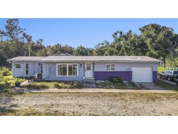 Ranch style home with attached garage at 1507 Lavilla Rd, Punta Gorda, FL 33950