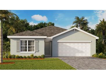 One story house with two car garage and nice landscaping at 83 Santarem Cir, Punta Gorda, FL 33983