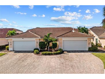 Two-unit building with attached garages and attractive landscaping at 3743 Albacete Cir # 84, Punta Gorda, FL 33950