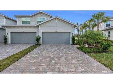 Two-car garage and paver driveway at 14624 Sycamore Ct # 2512, Punta Gorda, FL 33955