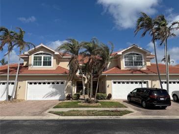 Two-story building with attached garages at 2620 Tarpon Cove Dr # 311, Punta Gorda, FL 33950