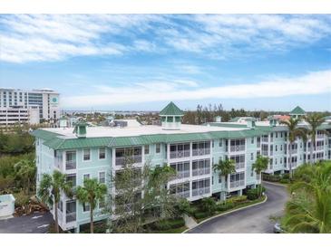 Aerial view of a waterfront community with resort-style amenities at 5117 Melbourne St # B302, Punta Gorda, FL 33980