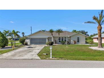 Single-Gathering home with driveway and landscaping at 167 Mocha Ct, Punta Gorda, FL 33983