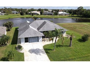 Single-Gathering home with a lake view at 1900 Nuremberg Blvd, Punta Gorda, FL 33983