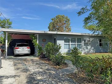 Cute bungalow with carport and nicely landscaped yard at 107 Dunn Ne Dr, Port Charlotte, FL 33952