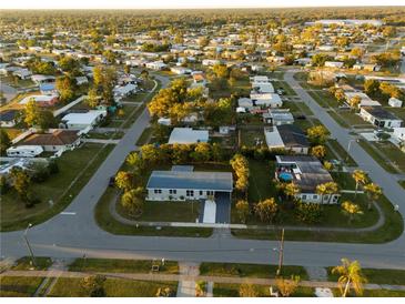 Aerial view showing home's location in a residential neighborhood at 22266 Catherine Ave, Port Charlotte, FL 33952