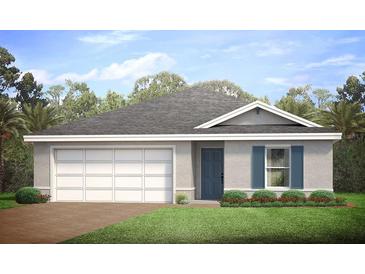 Single-story home with a two-car garage and landscaped lawn at 860 Chevy Chase St, Port Charlotte, FL 33948