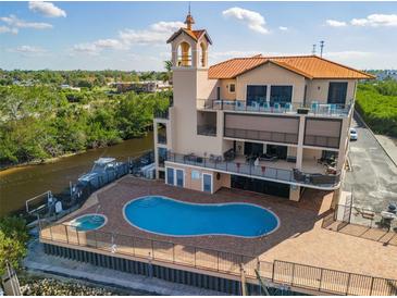 Luxury waterfront condo building with pool and boat slips at 900 E Marion Ave # 1403, Punta Gorda, FL 33950
