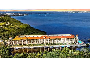 Stunning waterfront condos with private boat docks and community pool overlooking the beautiful bay waters at 900 E Marion Ave # 1301, Punta Gorda, FL 33950