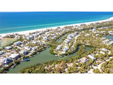 Beautiful waterfront property with direct beach access on the Gulf Coast at 20 Palm Dr, Placida, FL 33946