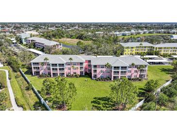 Charming multi-Gathering condominiums offer lush greenery, a lovely lawn and plenty of parking at 2061 Willow Hammock Cir # 105, Punta Gorda, FL 33983