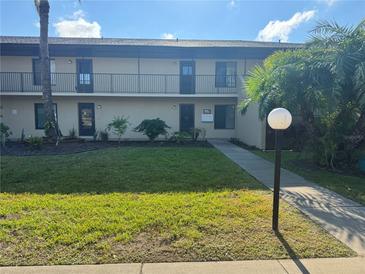 Inviting two-story condo with well-maintained lawn and landscaped garden at 4072 Oakview Dr # C5, Punta Gorda, FL 33980