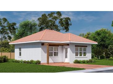 Cozy brick home with a charming pergola and a well-maintained lawn at 20208 Winkler Ave, Port Charlotte, FL 33954