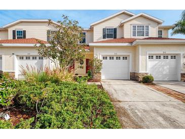 Inviting exterior featuring a well-manicured lawn and an attached one-car garage at 1156 Jonah Dr, North Port, FL 34289