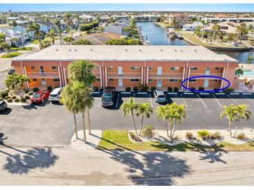 Condo in Cape Coral offering parking and waterfront views and access to the pool at 1345 Mediterranean Dr # A105, Punta Gorda, FL 33950