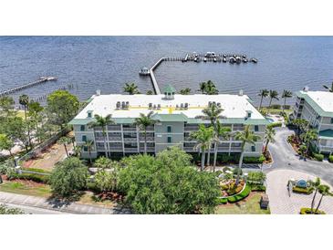Stunning waterfront condo with lush landscaping, private boat docks, and beautiful water views at 5114 Melbourne St # A202, Punta Gorda, FL 33980