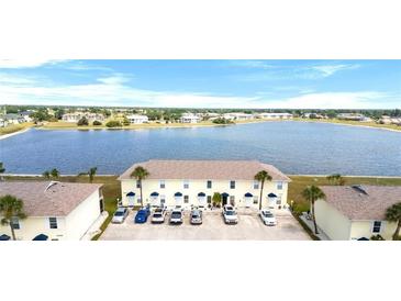 A charming multi-Gathering home with a beautiful lake view and ample parking spaces at 26290 Rampart Blvd # D, Punta Gorda, FL 33983