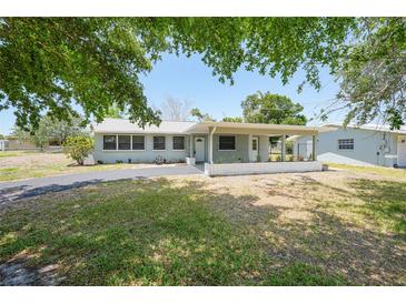 Charming single-story home featuring a covered porch and long driveway at 3515 Vasco St, Punta Gorda, FL 33950