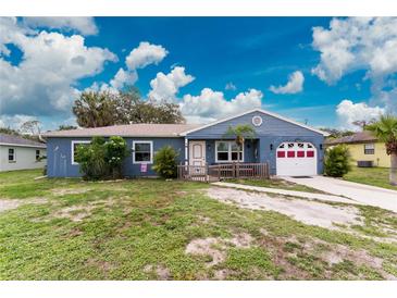Charming single-story home with a well-maintained front yard and a one-car garage at 4583 S Salford Blvd, North Port, FL 34287