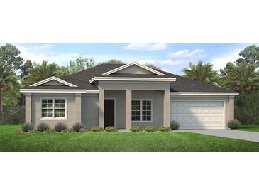 Charming single-story home features a two-car garage and well-maintained landscaping at 2308 Oberon Ln, Punta Gorda, FL 33983