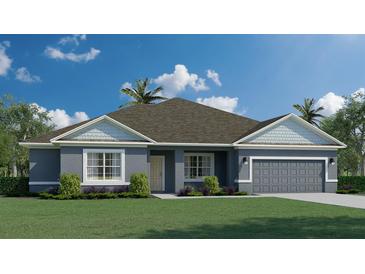 Charming one-story home showcasing a well-manicured lawn, gray exterior, and attached garage at 3984 Junction St, North Port, FL 34288